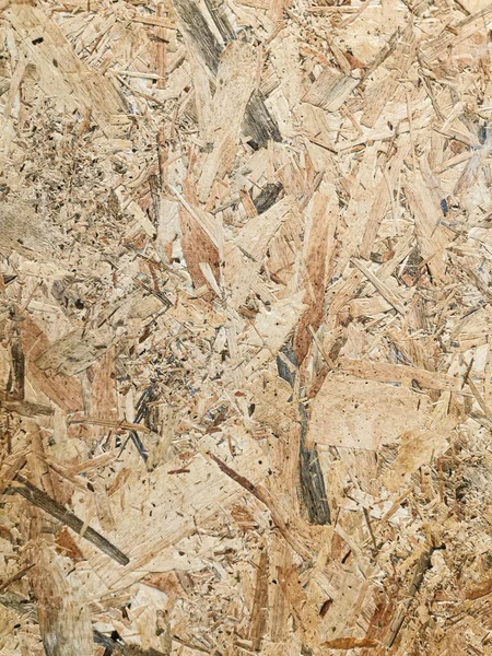 OSB oriented strand board surface texture. Background for wood and craft feeling.