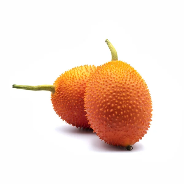 Momordica cochinchinensis fruit on white background. — Stock Photo, Image