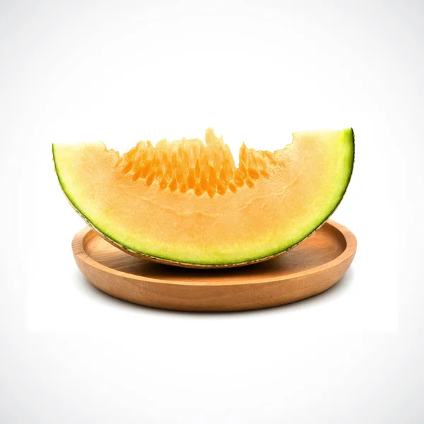 Cantaloupe Melon, In een houten bord met sinaasappelvlees op de Whi — Stockfoto