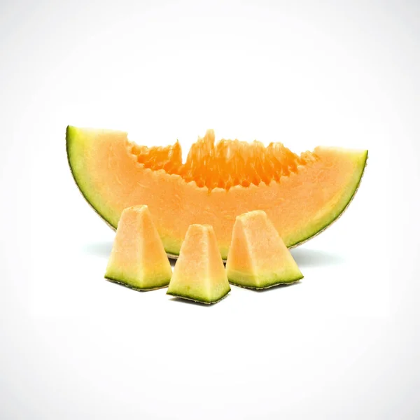Kavun, beyaz karasahana üzerinde portakal eti. — Stok fotoğraf