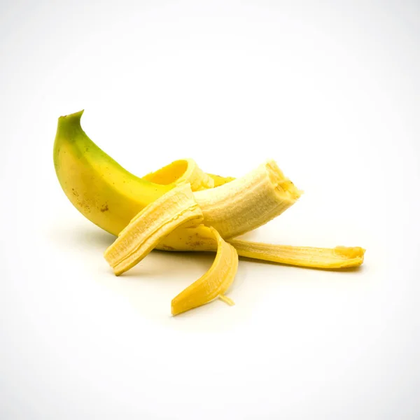 Banana peel almost ripe on the white background. — 스톡 사진