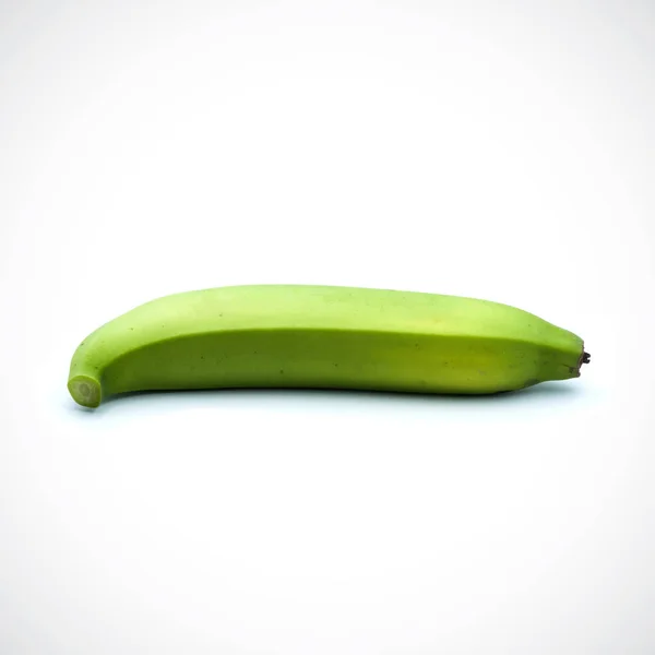 One banana almost ripe on the white background — 스톡 사진
