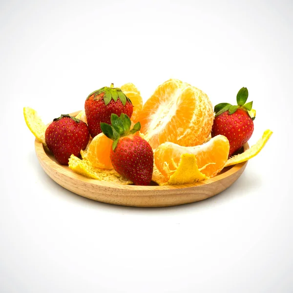 Orange,fruit Sour taste in wood plate on a white background.