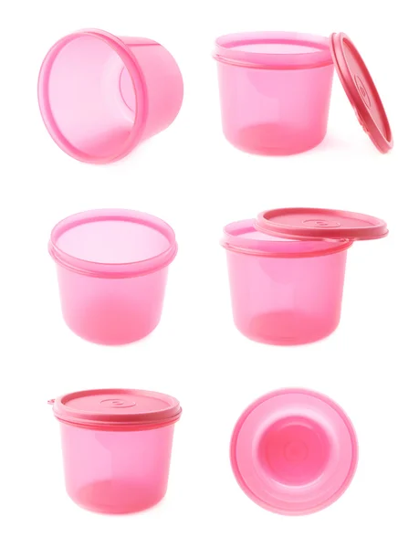 Růžové Plastové kádinky pohár izolovaných bílém pozadí — Stock fotografie