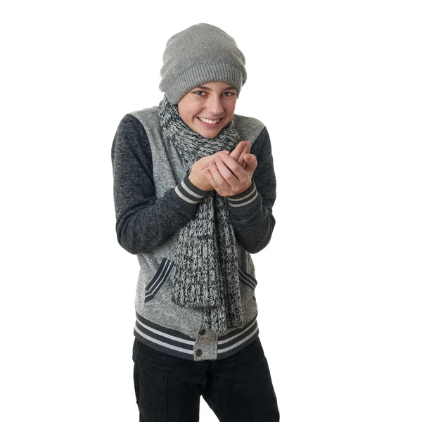 Niedlicher Teenager Junge in grauem Pullover über weißem isoliertem Hintergrund — Stockfoto