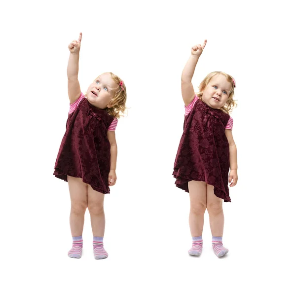 Young little girl standing over isolated white background Royalty Free Stock Images