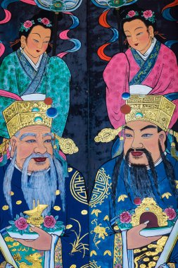 Malezya 'nın Penang kentindeki Georgetown' da Taocu Teochew tarzı bir Çin tapınağı olan Han Jiang Ata Tapınağı 'nın boyalı kapılarına yakın plan. Unesco Asya-Pasifik Kültür Mirası Koruma Ödülü.