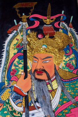 Malezya, Penang 'da Georgetown' da Taocu Teochew tarzı bir tapınak olan Han Jiang Atalarının boyanmış kapılarının savaşçı muhafızına yakın plan. Unesco Asya-Pasifik Kültür Mirası Koruma Ödülü.