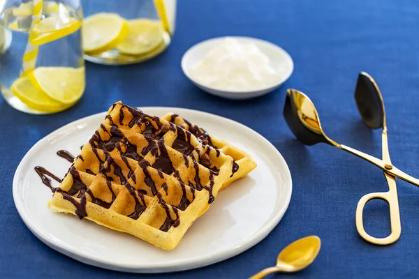 Belgian Waffles Chocolate Sauce Aside Golden Spoon Golden Tongs Whipped Stock Picture