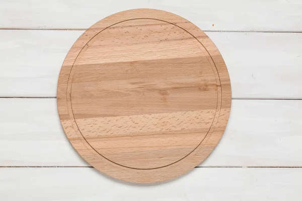 Cutting board on wooden white — Stock Photo, Image