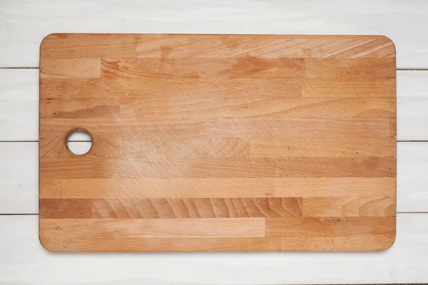 Cutting board on wood white — Stock Photo, Image