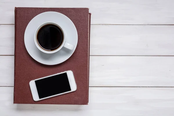 Book and smartphone, top view — Stock Photo, Image