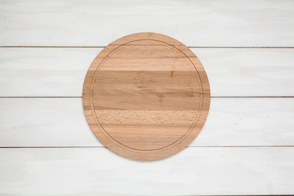 Cutting board on wood white — Stock Photo, Image