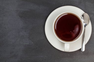 Kupa siyah çay. Doku. Tasarımlarınız için. Güzel. Parlak.