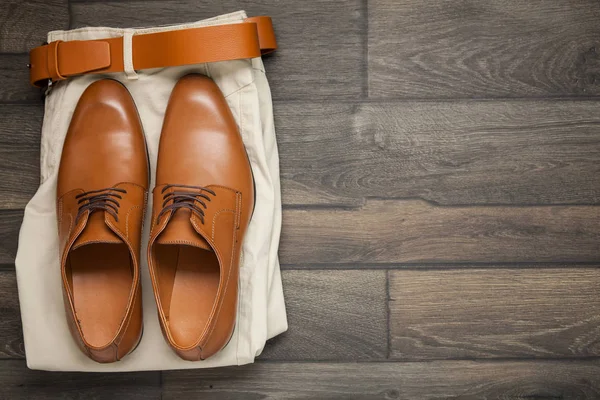 Leather brown shoes and trousers — Stock Photo, Image