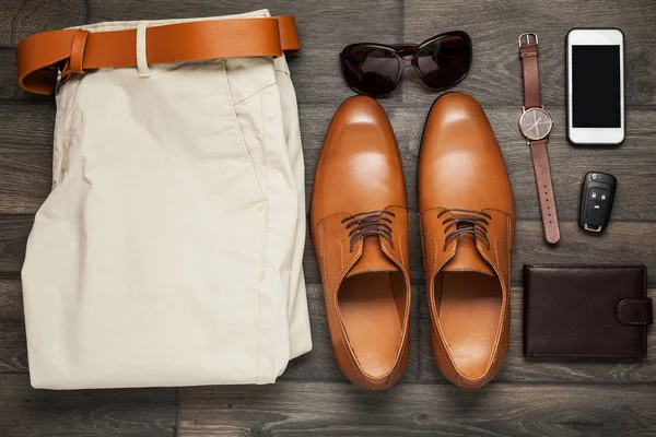 Smartphone, brown shoes, Trousers and — Stock Photo, Image