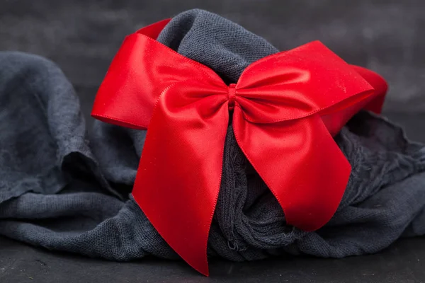 Red bow on a black — Stock Photo, Image