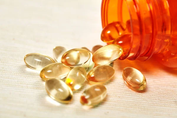 İlaçlar. Vitamin E. kapsül. Tasarımlarınız için. Tıp. Sağlık. — Stok fotoğraf