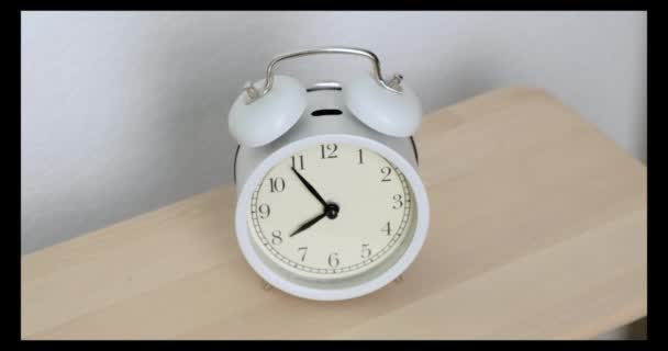 Mens hands off ringing white alarm clock. Close up. — 비디오