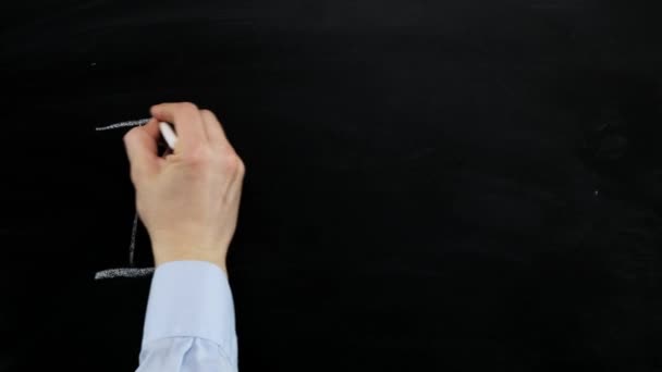 Hand writing i miss you with white chalk on blackboard. Close up. — Stock Video