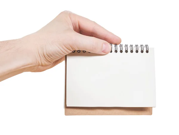 Mãos masculinas segurando almofada de papel isolado em um fundo branco. Fechar — Fotografia de Stock