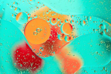 Modaya uygun bir arka planda turuncu-kırmızı bulanık lekeler. Arkaplan, doku