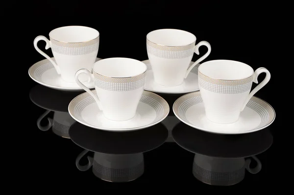 Tee-Set auf schwarzem Hintergrund — Stockfoto