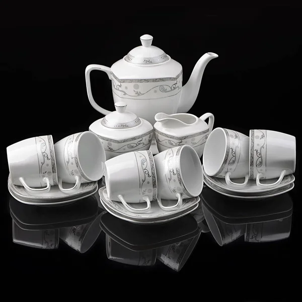 Набір чаю порожній ізольований на чорному тлі Стокове Фото