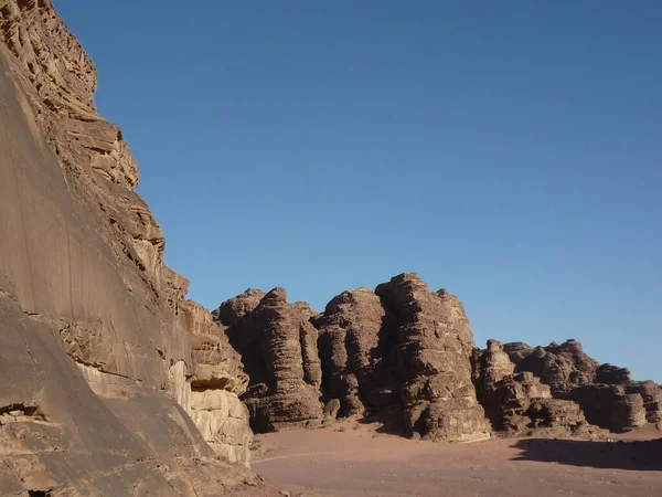 Beautiful unreal landscape, of the Wadi RAM desert Jordan - sun, desert, mountains and rocks, the blue sky
