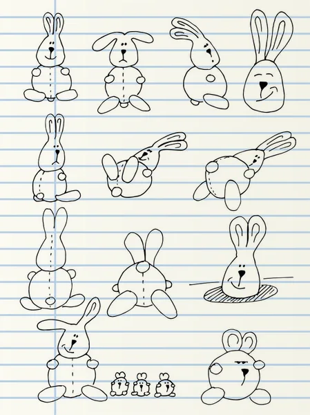Mignon lapins en peluche dessinés à la main — Image vectorielle
