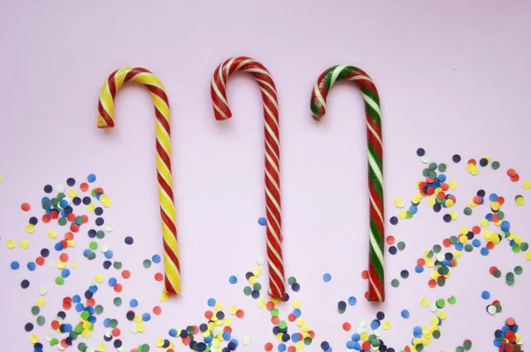 Christmas candy canes. Candy for Christmas and New year, candy sticks in stripes.  Preparation for the holiday. Candy.