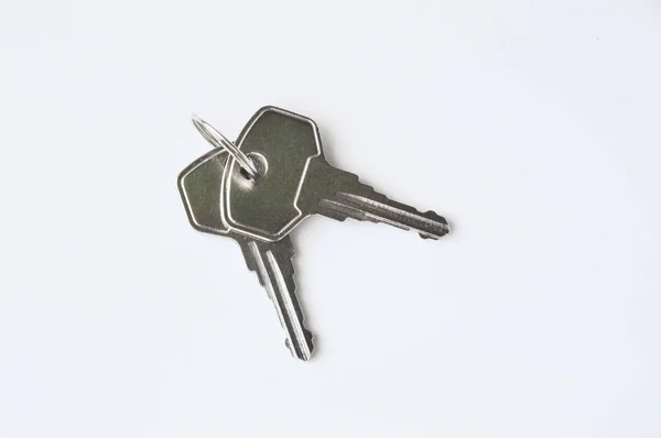 Γκρι Μεταλλικά Πλήκτρα Λευκό Φόντο Κλειδιά Για Την Κλειδαριά Δύο — Φωτογραφία Αρχείου