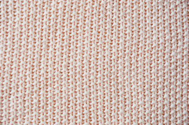Kumaşın dokusu. Dekorasyon için pembe örülmüş arkaplan.