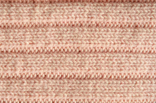 Örgü kumaşın zarif dokusu. Tasarım için arkaplan.