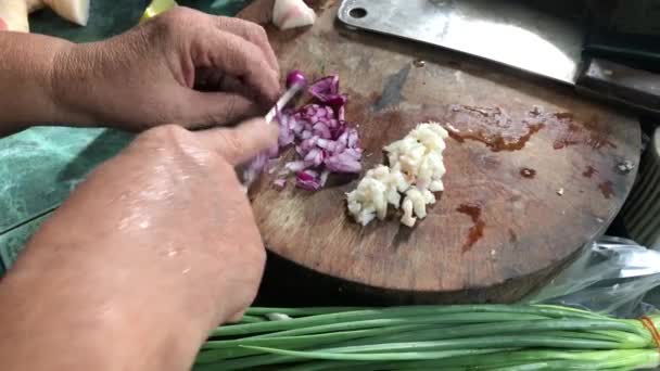 Closeup Woman Chopping Onion Wooden Board — Stock Video