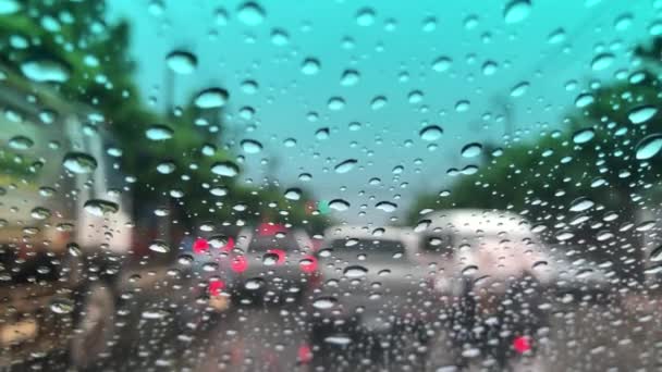 Defocused Image Raindrop Car Windshield Blurred Traffic Road City Drive — Stock Video