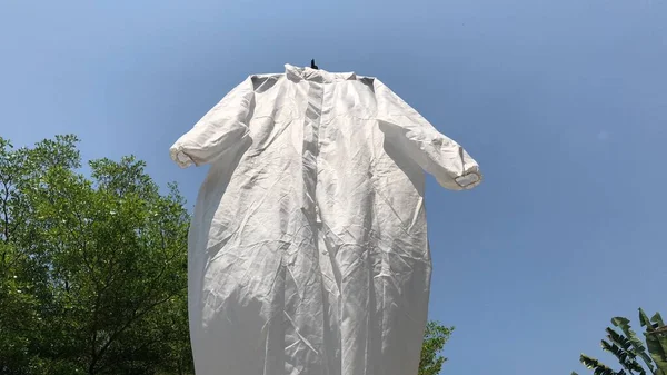 Protective Ppe Suit Hanging Outdoor Used Washing Natural Glare Light — Stock Photo, Image