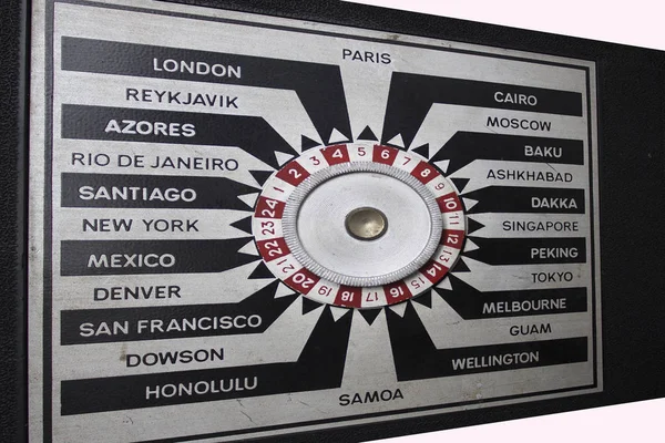 Cities of the world connected on the hub-spoke type indicator of a vintage radio.