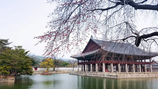 Landscape view of the Gyeonghoeru Pavilion and the pond beneath at the Gyeongbokgung Palace, Seoul on a spring day.