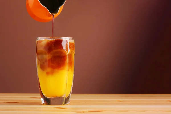 Orange Nitro Coffee Wooden Table Closeup — Stock Photo, Image