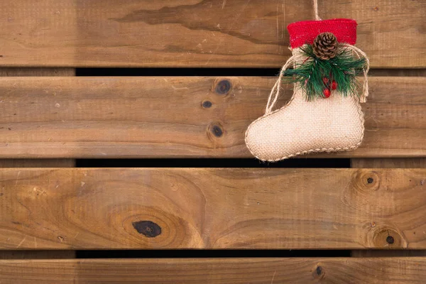 Calcetín de Navidad sobre fondo de madera —  Fotos de Stock