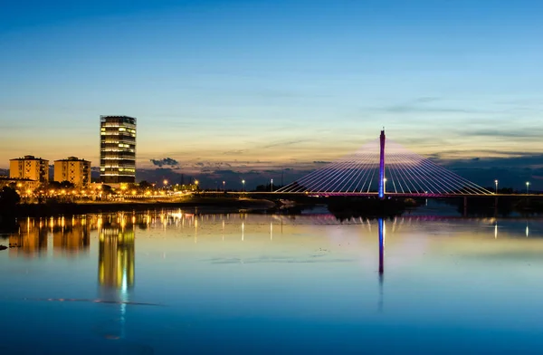 Night view of Royal Bridge over Guadiana River in Badajoz. Stock Image