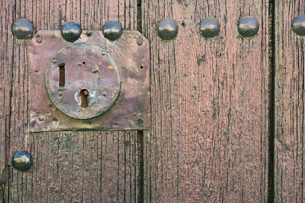 Old door with keyhole — Stock Photo, Image