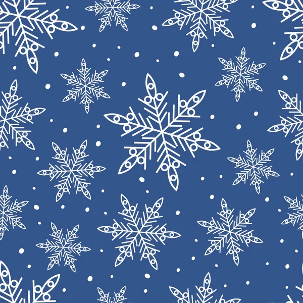 Padrão de Natal com flocos de neve brancos isolados no fundo azul . — Vetor de Stock