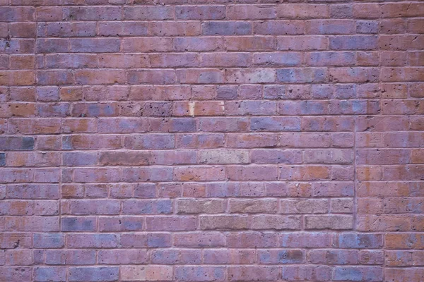 Katı kırmızı turuncu tuğla duvar — Stok fotoğraf