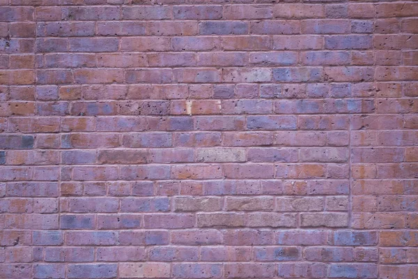 Massief rood oranje metselwerk bakstenen muur — Stockfoto