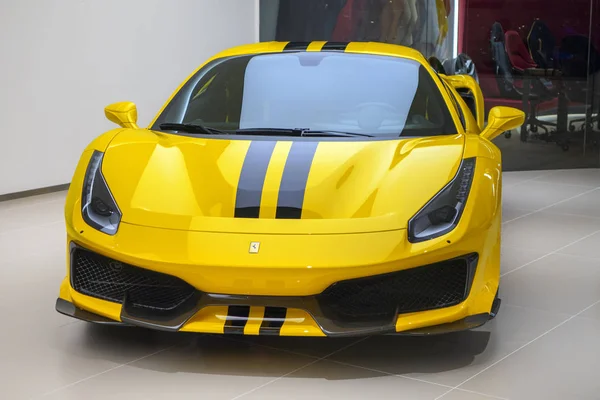 Yellow black spripes Luxury sports car Ferrari 488 Pista at show — стокове фото