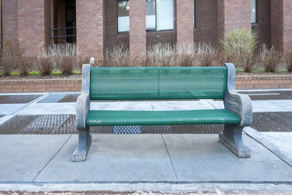 metal concert green park sidewalk public seating bench