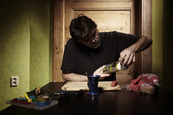 Extremist making his pipe bomb — Stock Photo, Image