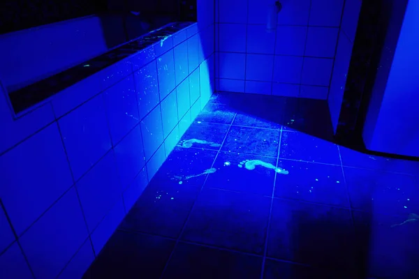 Clean Place Of Bloody Crime Under Ultra Violet Black Light Stock Photo